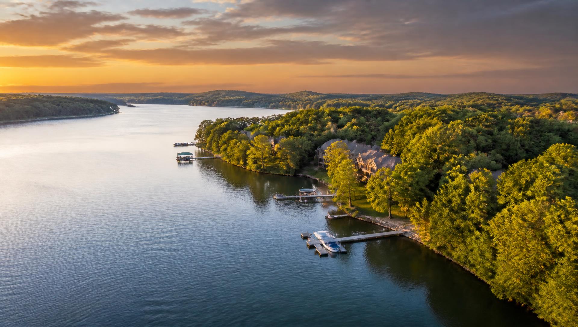 Aerial view of Cow Bay shoreline at golden hour